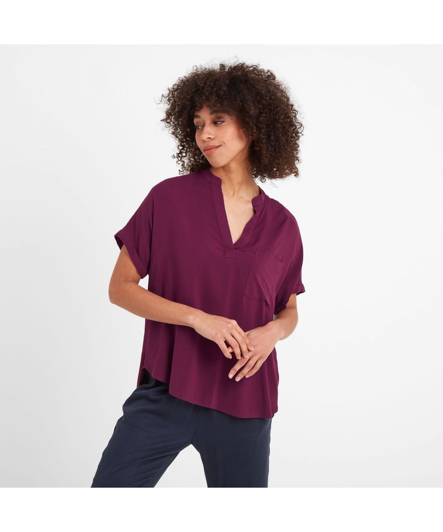 Cool and comfortable, our Nellie overhead short sleeve shirt comes in supersoft viscose that drapes beautifully. This easy to wear shirt has a v-neck opening, flattering dropped armholes for a relaxed, boxy fit and a single pleat at the back for extra movement. Loose short sleeves with turn-ups that stay in place and a patch pocket on the chest complete the casual look. Designed by our team based in the beautiful Spen Valley in West Yorkshire with colours inspired by wild moorland heather, Nellie is finished with a discreet woven TOG24 label on the side seam standing for Truth Over Glory.