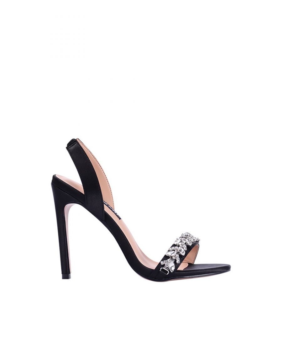 Glam up your outfit with the Gissa from Nine West, a high stiletto sandal with an elegant floral diamante strap at the front of the foot.  The sling back holds the foot in place with it's elasticated panel for added support.