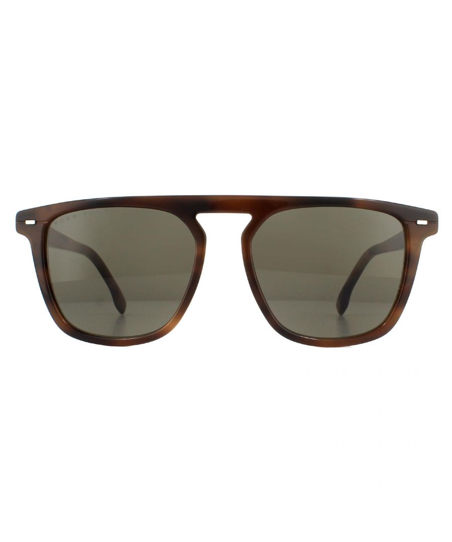 Hugo Boss Sunglasses BOSS 1127/S 05L 70 Havana Brown are a contemporary square style crafted from lightweight acetate featuring a keyhole bridge, thick top bar and corner flicks and the temples are branded with  the Hugo Boss logo.