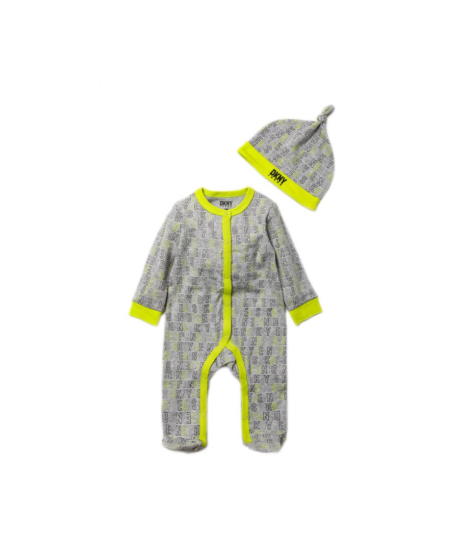 This adorable DKNY Jeans two-piece set includes a printed sleepsuit, and a matching hat with the DKNY Jeans logo. The set is cotton, with popper fastenings, keeping your little one comfortable. This would make a sweet gift for the little one in your life!