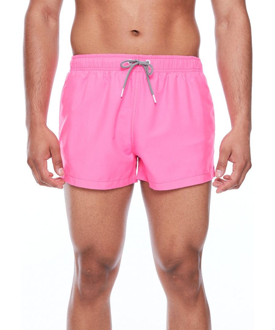 There's something magical about the Summer and we don't just mean when the water gets warmer, the music gets louder, drinks get colder and when the nights get longer. Step into our Magenta Water Reactive swim shorts to unveil our classic palm print when you take a dip. They're made from 100% super-soft, quick drying polyester and come in a shortie-length.