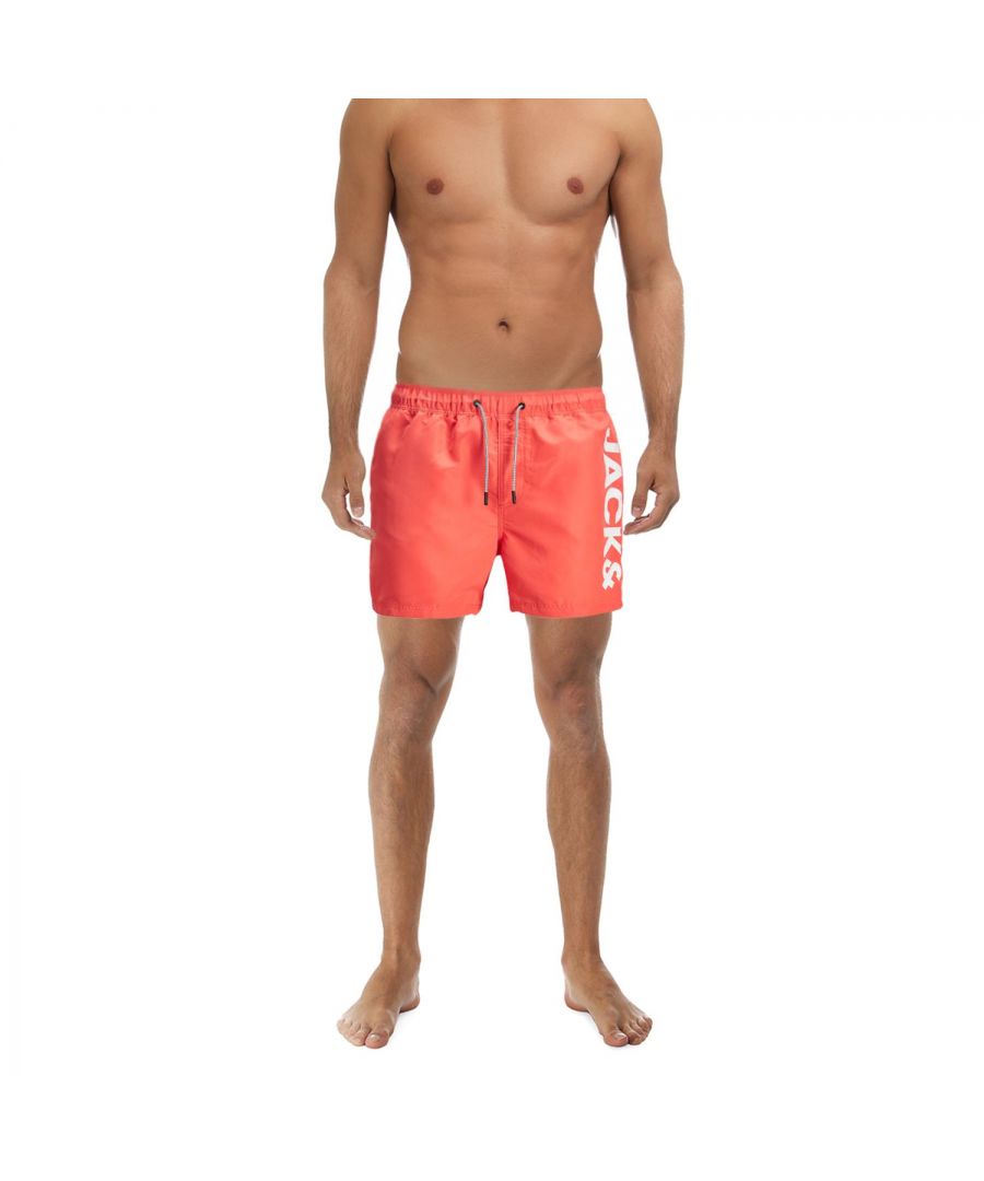 Take a dip in the pool whilst looking your fashionable best with these swim shorts from Jack & Jones. Whether you're chilling by the pool, catching the surf in the sea, or enjoying that water slide, these shorts will keep you comfy and ahead of the fashion curve. \n\nFeatures:\nMen's Swim Shorts\nElasticated-adjustable waist with drawstring\nSlit side pockets\nPatch back pocket\nMade of fast-drying material\nLogo on the side in contrasting colour\nSolid Color design\n\nWashing Instruction:\nMachine wash at max 30°C under fine wash programme\nDo not bleach\nLine drying\nDo not dry clean\nIron at low temperature\n\nPackage Includes: Jack & Jones Men's Swim Shorts
