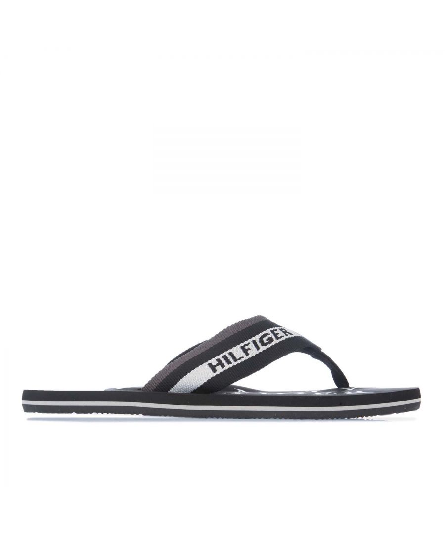 Mens Tommy Hilfiger Martitime Sandal in black.- Synthetic upper.- Slip on closure.- Y-shaped soft webbing straps.- Signature print on the insole and Tommy Hilfiger logo on strap.- Cushioned Sole.- Flexible EVA foam footbed.- Rubber sole.- Synthetic Upper  Textile Lining  Synthetic Sole.- Ref.: FM0FM02693BDS