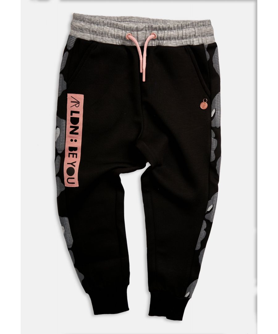Nail your everyday style with these fabulous performance based joggers. Style led with animal print side stripes but in a practical super soft jersey. Wear with the matching hoody for the ultimate tracksuit.  Angel & Rocket cares: made with 100% cotton.  Black  100% Polyester  Look after me: think planet  machine wash at 30c