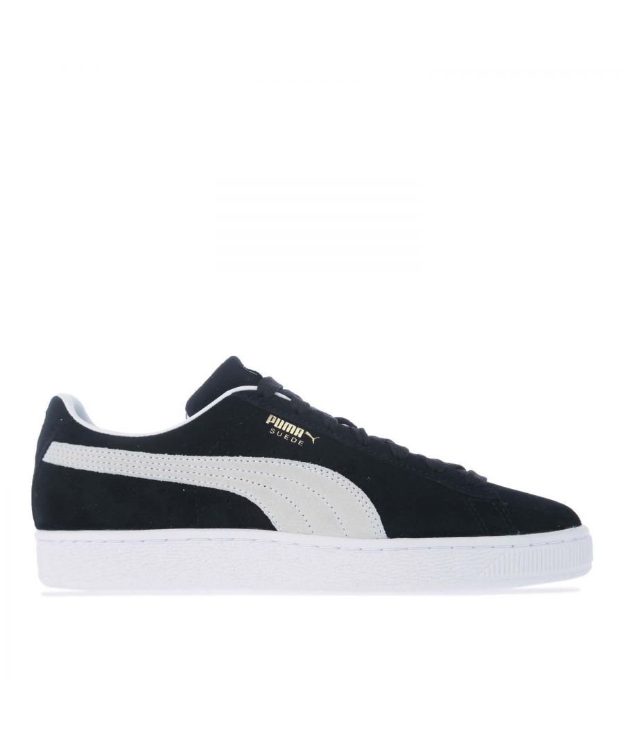 Puma Suede Classic XXI Trainers in peacoat - puma white.- Leather and suede upper.- Lace fastening.- Low-rise silhouette in a navy and white colourway.- Puma branding on the sidewall.- Rubber sole.- Leather and suede upper  Textile lining  Synthetic sole.- Ref: 37491504