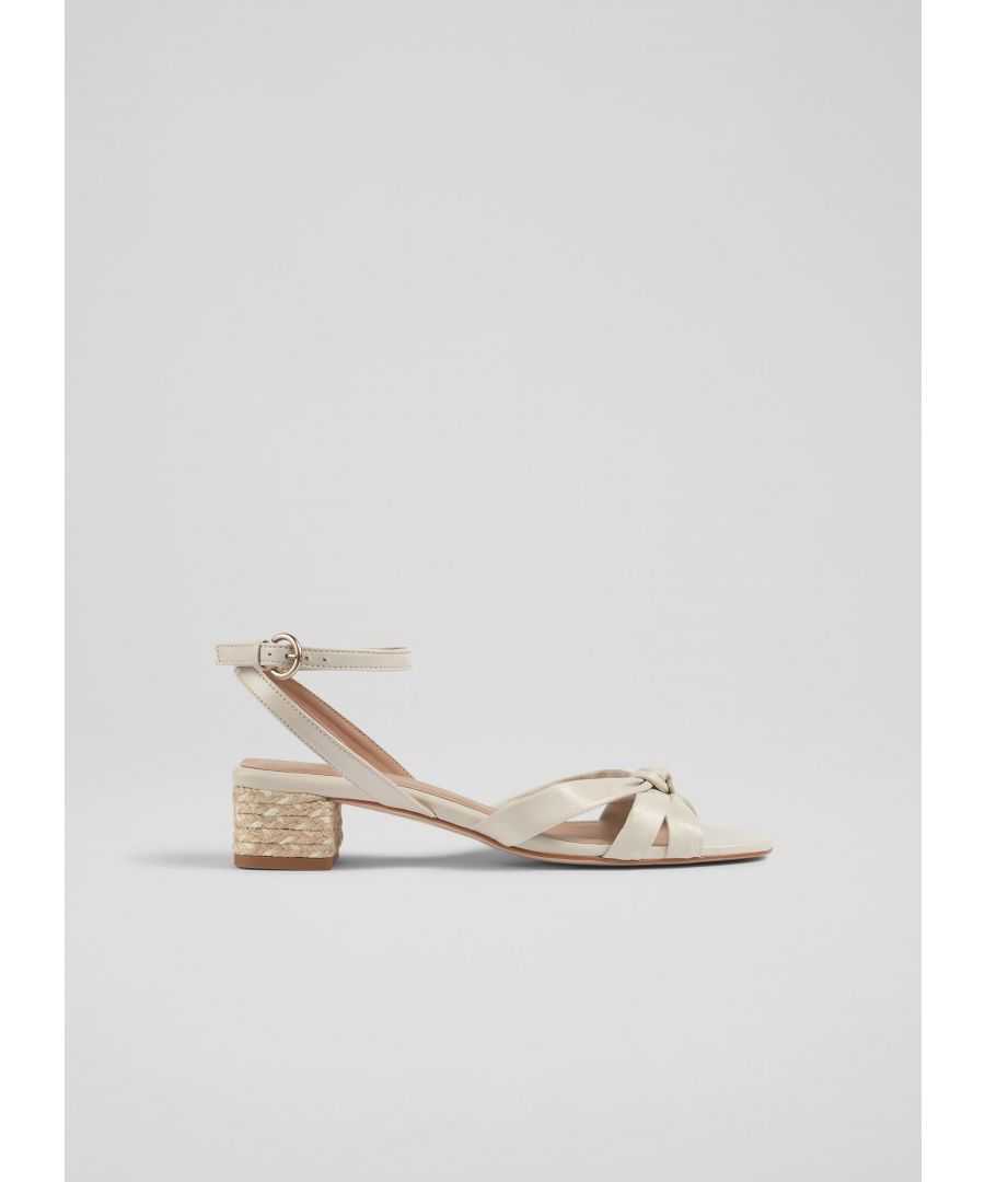 A great everyday sandal, our Peyton sandals offer comfort and a little height. Crafted in Spain from super-soft cream nappa leather, they're a strappy style that knot at the front, have a buckled ankle strap and an espadrille, 35mm block heel. Wear them with summer dresses and tailored pieces alike.