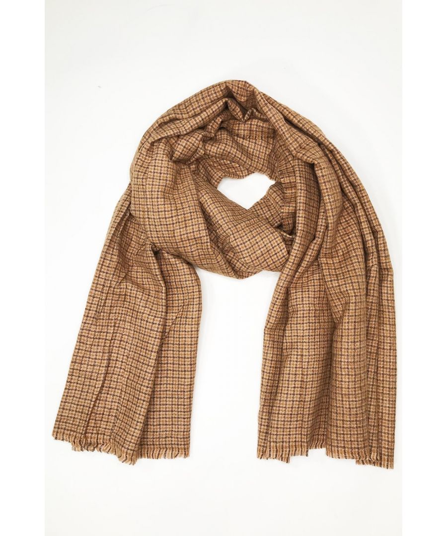 Luxury cashmere blend wrap in classical tartan check design with fringed hem. A lovely piece to add to your Collection.