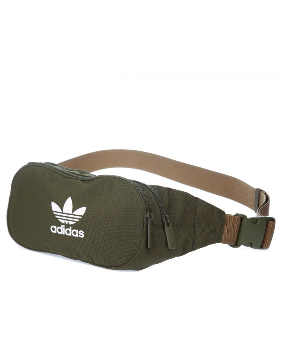 adidas Originals Essential Crossbody Bag in green.- Adjustable strap with clip.- Zip fastening main compartment and front pocket.- Plain weave.- Dimensions: 36 cm x 21 cm x 5.5 cm.- Main Material: 100% Polyester (Recycled). Lining: 100% Polyester (Recycled).- Ref: GN5443Measurements are intended for guidance only.
