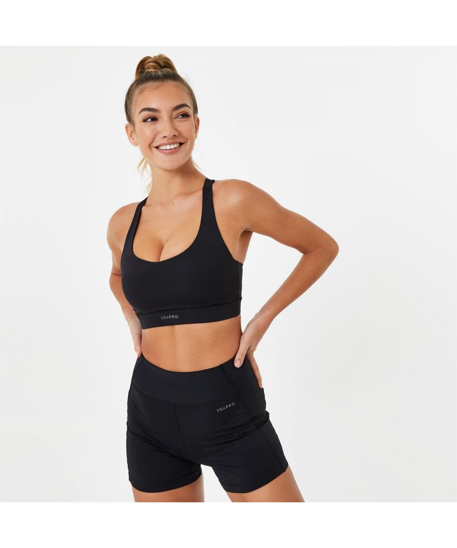 This USA PRO versatile sports bra is super flattering and fashion-forward. Detailed with a cross back, this design embraces modern styling for a contemporary spin. Designed with Pro-dry technology so sweat wicks away from skin and leaves you feeling comfortable throughout your routine. In array of styles, there's a sports bra for everybody, now is the perfect time to find your favourite fitness staple.  >Pro-dry  >Medium support  >Scoop neckline  >Cross back detail  >Body: 78% nylon, 22% elastane  >Power mesh: 88% polyester, 25% elastane  >Machine washable