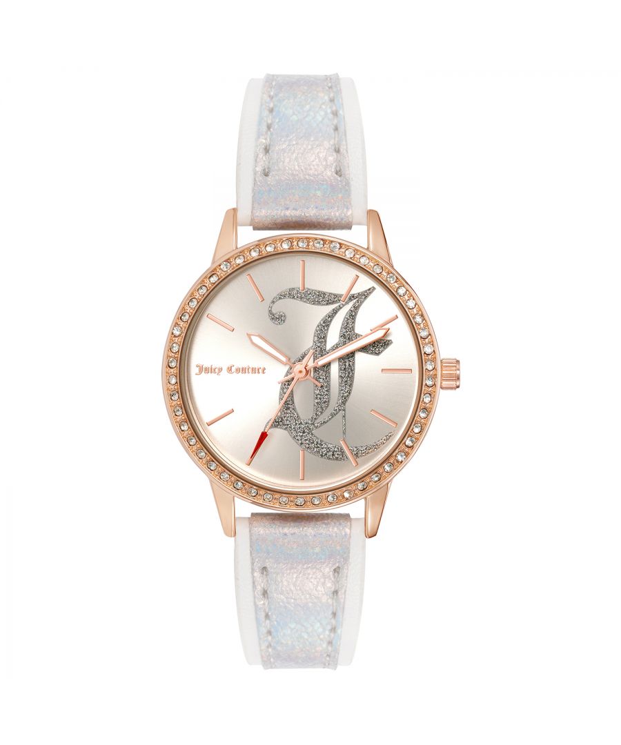 Juicy Couture Watch JC/1292RGSI\nGender: Women\nMain color: Rose Gold\nClockwork: Quartz: Battery\nDisplay format: Analog\nWater resistance: 0 ATM\nClosure: Pin Buckle\nFunctions: No Extra Function\nCase color: Rose Gold\nCase material: Metal\nCase width: 34\nCase length: 34\nFacing: Rhine Stone\nWristband color: White\nWristband material: Leatherette\nStrap connecting width: 17\nWrist circumference (max.): 22.5\nShipment includes: Watch box\nStyle: Fashion\nCase height: 8\nGlass: Mineral Glass\nDisplay color: Silver\nPower reserve: No automatic\nbezel: none\nWatches Extra: None
