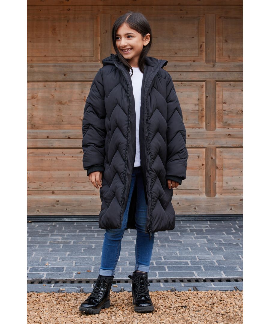 Take on the weather in family style with this jacket from the Threadbare family range. This puffer jacket features a funnel neck collar with hood, two front pockets, zig-zag padding and two front pockets. Finished with a branded badge on the left arm. Matching mens, ladies and boys styles are available.