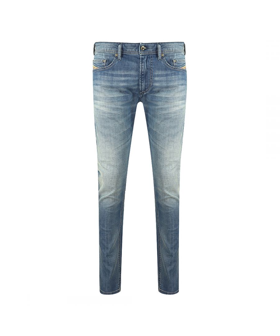 Diesel Thavar-XP R18W6 jeans. Verweerd en vervaagd. Stretchdenim 98% katoen en 2% elastaan. Skinny pasvorm. Ritssluiting. Stijl - Thavar-XP R18W6