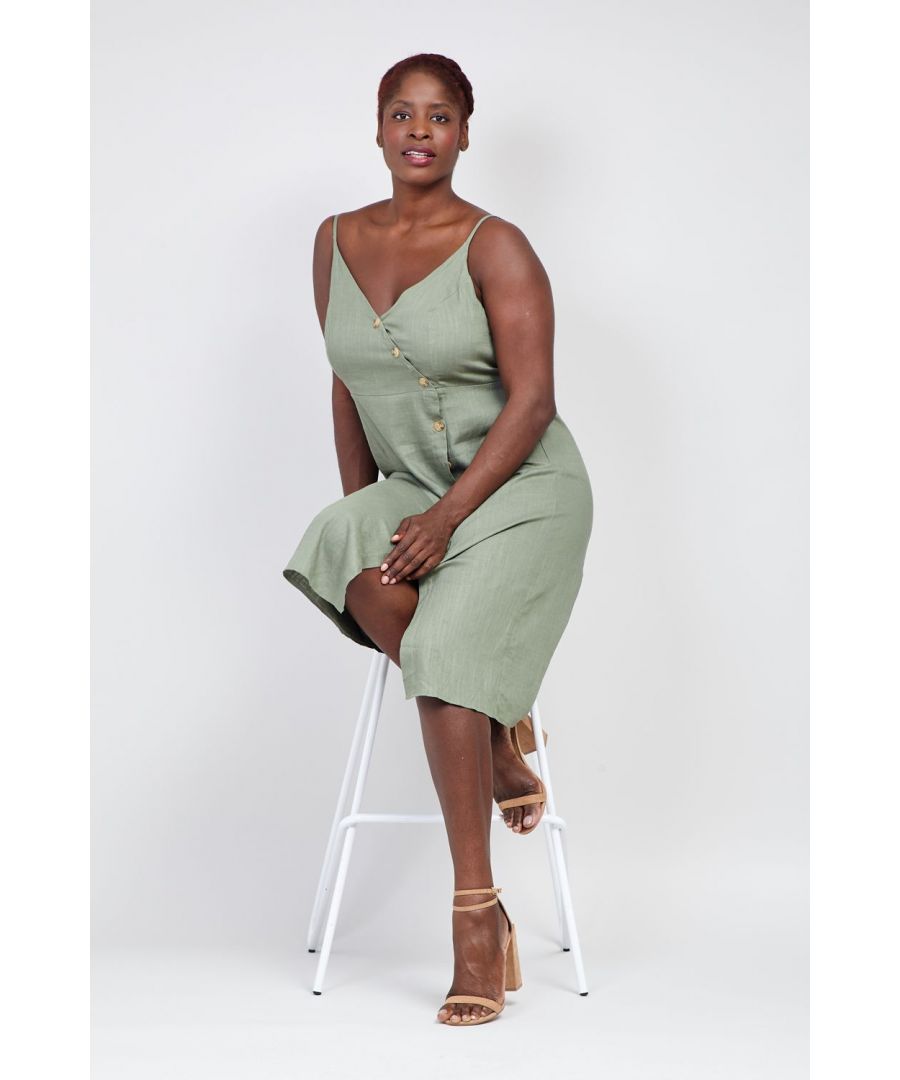 Get holiday ready with this super cute button front cami dress this summer. It is sleeveless, has a button up front and comes in a midi length. Wear with wedges for day to night style.