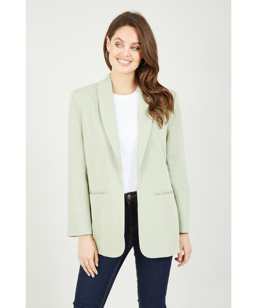 Stand out from the crowd, and show them you mean business by choosing interesting colour this season. In a stunning  fabric and the perfect shade of soft Sage Green to enrich your weekend wardrobe. The Yumi Sage Green Blazer is a great addition to your workwear rotation, team it with jeans and a button down shirt for major style points.