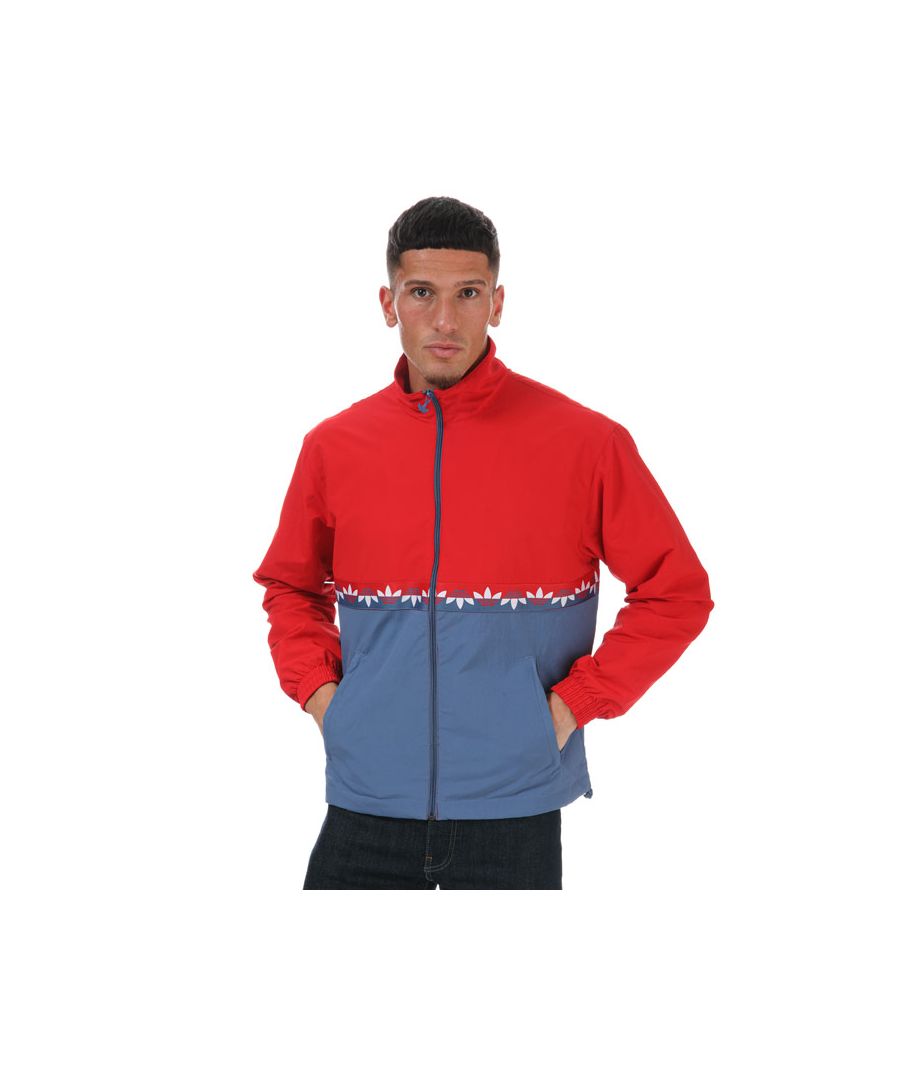 Mens adidas Originals Adicolor Sliced Trefoil Track Top in blue red.- Stand-up collar.- Full zip fastening.- Front zip pockets.- Elastic cuffs.- Bungee-adjustable hem.- Regular fit.- Shell: 100% Polyamid (Recycled). Lining: 100% Polyester (Recycled). Machine washable. - Ref: GN3437