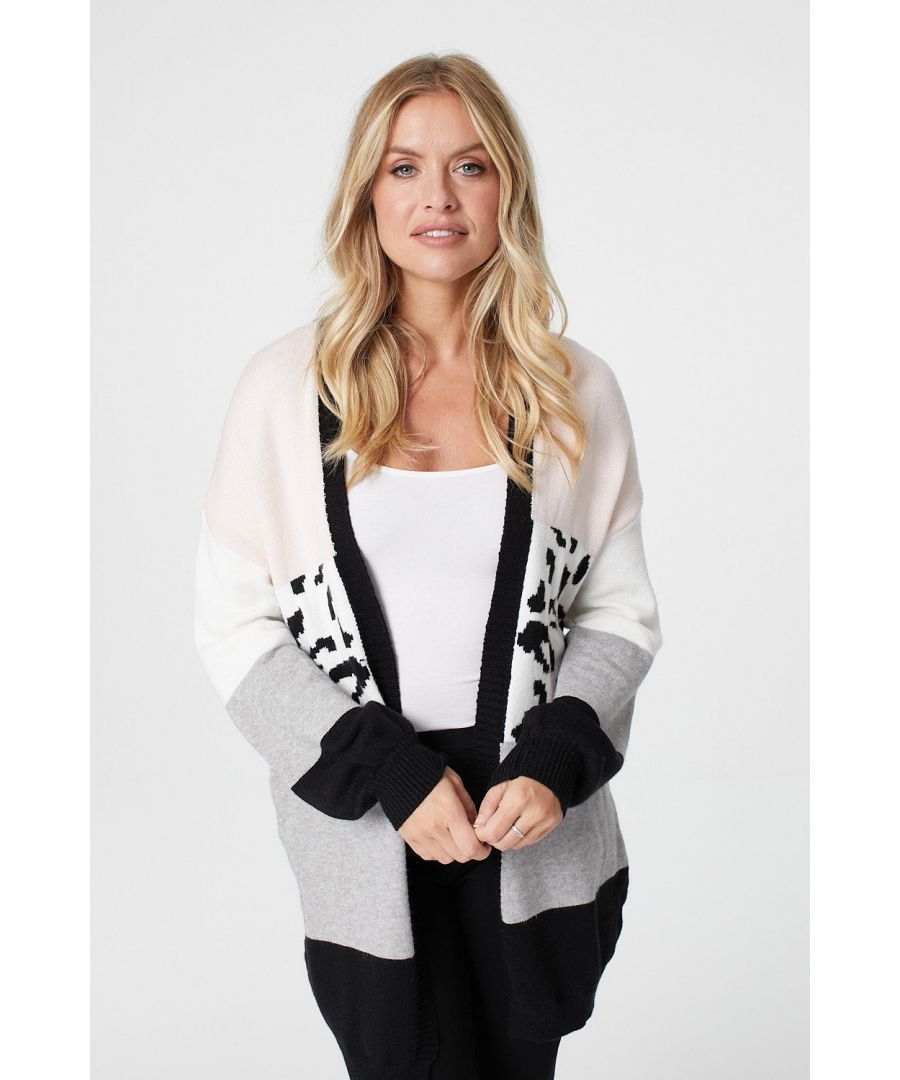 Add a classic open front cardigan to your closet with this oversized colour block animal print style. With long sleeves and a longline relaxed fit sitting above the knee. Pair with a cami top and jeans for an easy-going transitional outfit.