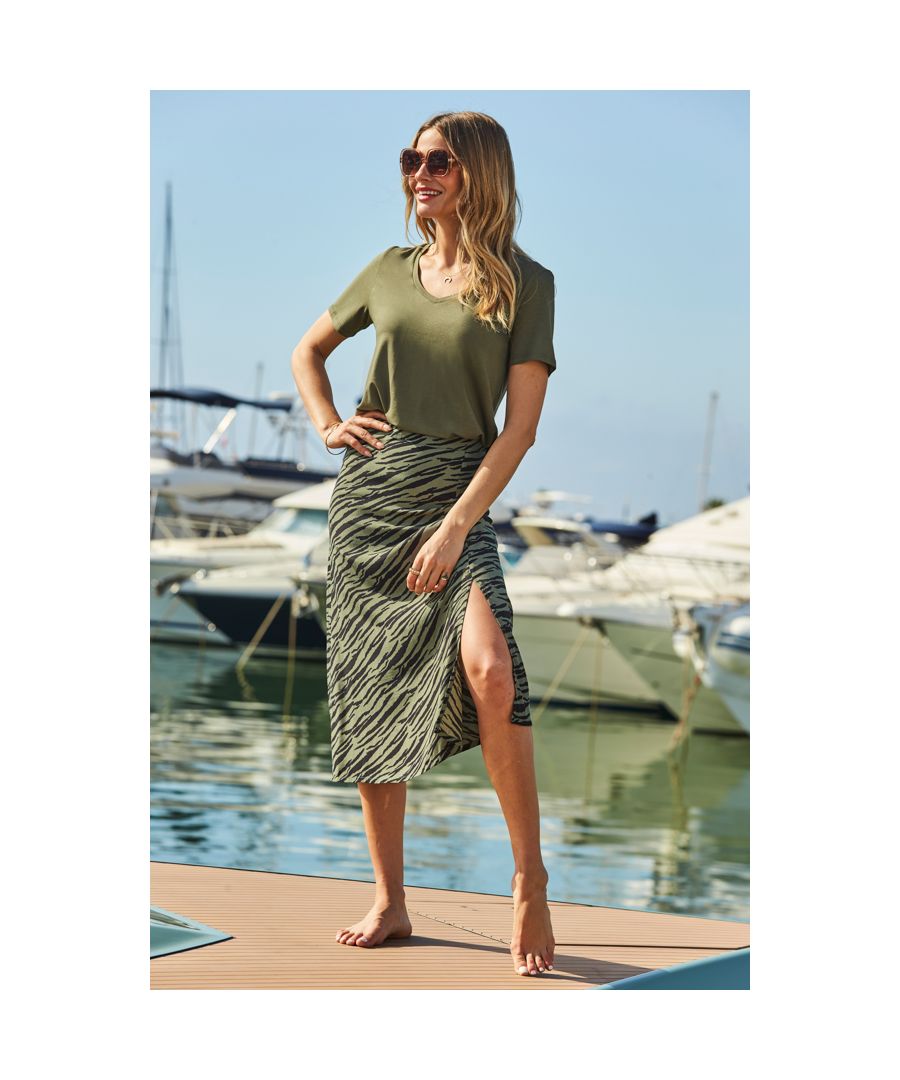 REASONS TO BUY:\n\nA new friend for your nice tops\nSits high on the waist for a flattering fit\nClassic A-line skirt\nKhaki zebra print you won't find anywhere else\nSexy front split - wear it day or night\nWith a khaki tee and trainers or a black cami and heels