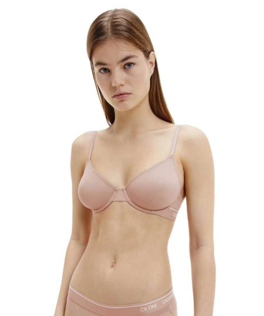 This t-shirt bra from the CK One Micro range at Calvin Klein is a perfect everyday bra with no-fuss or snagging of the skin with minimal detailing for an effortless look and feel. The demi cups have no padding and are underwired for a natural bust shape, and are created from a super-soft microfibre so you will have all day comfort. The straps and underband feature the iconic Calvin Klein branding in a subtle style.\n\nEveryday, soft t-shirt bra\nDemi cups with no padding\nUnderwired\nAdjustable straps\nHook and eye closure\nCalvin Klein branding\nComposition: 80% Polyamide | 20% Elastane\n\nListed in UK sizes