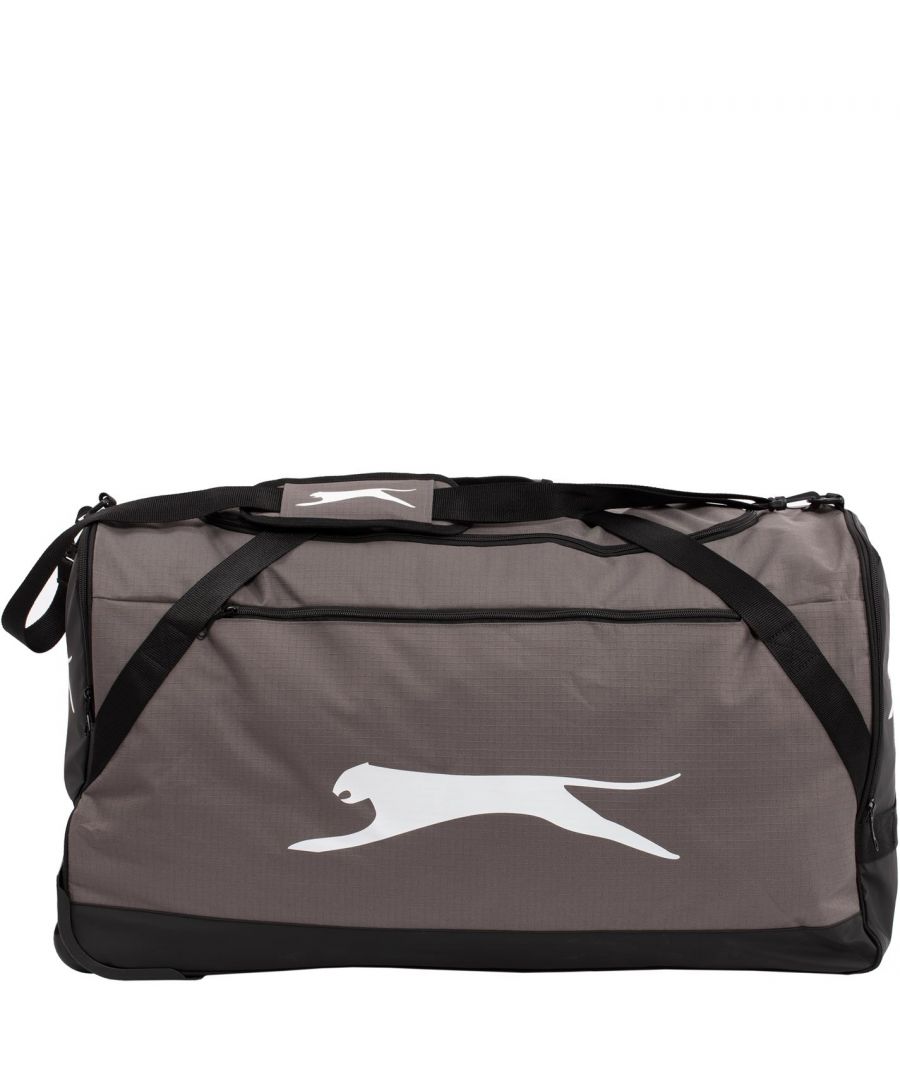 Slazenger Wheel Holdall - The Slazenger Wheel Holdall is perfect for a weekend away, holiday or for your gym equipment with a large main zipped compartment. This holdall bag has two durable carry handles with durable wheels so you easily transport around without strain. > Holdall > Carry handles > Large main compartment > Reinforced bottom > Zipped side pockets > Zip fastening > Wheels > Slazenger branding logo > 70cm x 39cm x 38cm