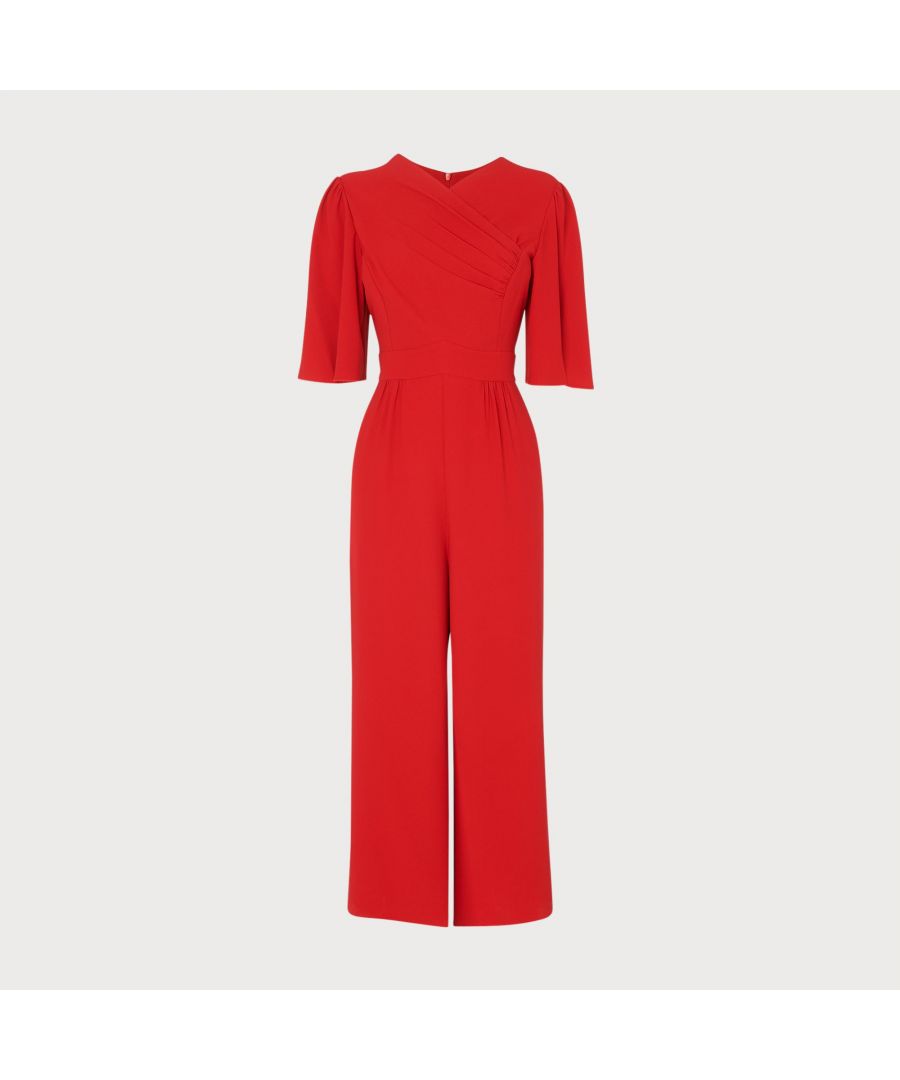 With intricate folding and pleating detail, our Clemence jumpsuit is a beautifully-crafted occasion all-in-one. Made from a bold red crepe, it has a crossover neckline with pretty pleating, subtle puff shoulders and wide sleeves, a nipped waist, mini pleats at the hips and wide-leg trousers. Wear it with a pair of wedges or strappy leather sandals and a contrast-colour clutch.