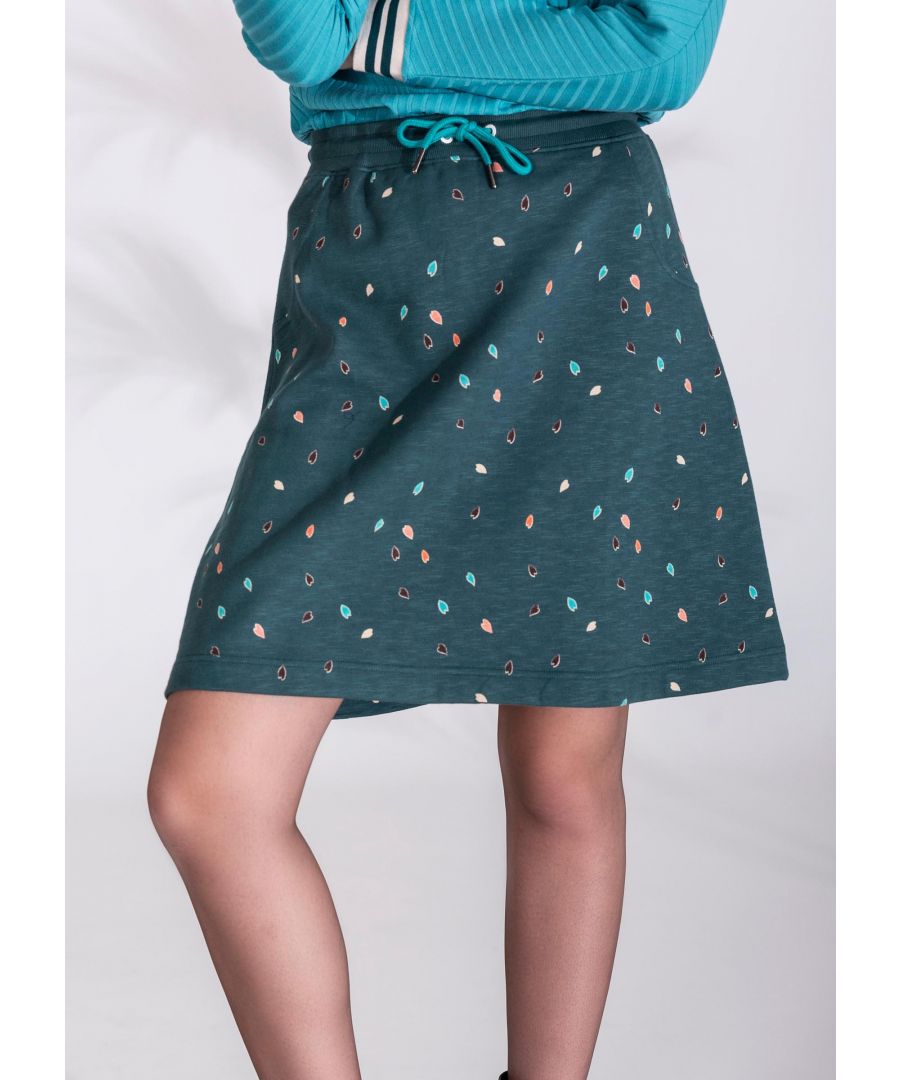 Deze diepgroene rok met zakken en kleurrijk motief van kleine blaadjes heeft een elastische tailleband met koord voor de perfecte pasvorm.