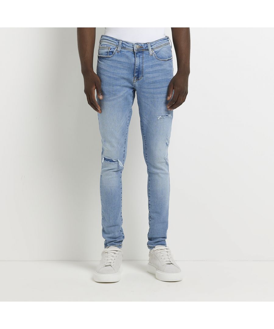 > Brand: River Island> Department: Men> Material Composition: 100% Cotton> Material: Cotton> Type: Jeans> Style: Skinny> Size Type: Regular> Fit: Extra-Slim> Pattern: No Pattern> Occasion: Casual> Season: SS22> Pocket Design: 5-Pocket Design> Fabric Wash: Light> Closure: Button> Distressed: Yes> Brace Buttons/Belt Loops: Belt Loops