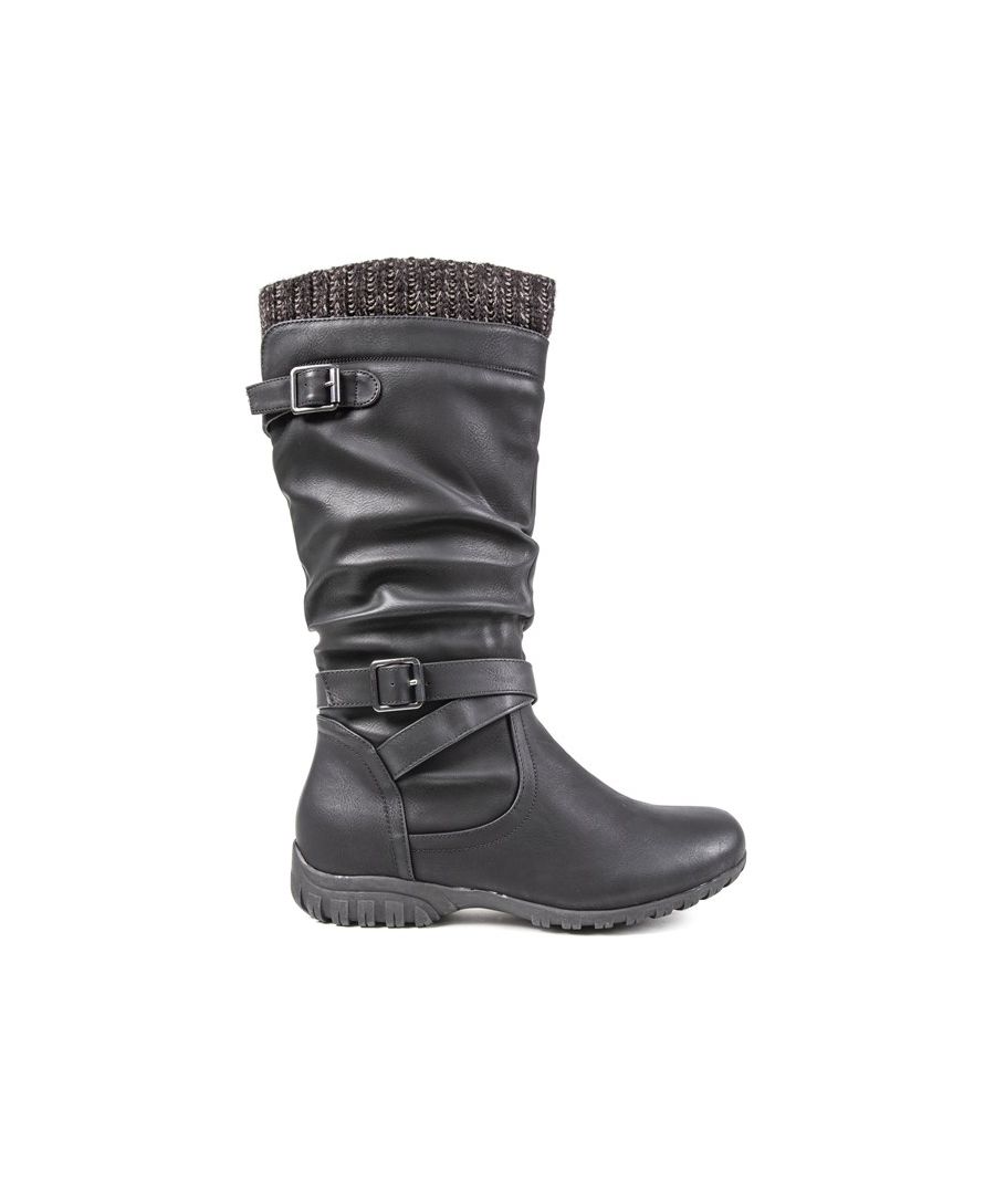 Black Knee-high Solesister Bernice Zip Up Boots With Slouch Synthetic Upper Featuring Double Wrap Around Straps And Buckles, A Dark Grey Knit Cuff, And Full-length Zip. These Biker Inspired Boots Have A Textile Lining, Branded Synthetic Sock, And Black Sole With Extended Tread.