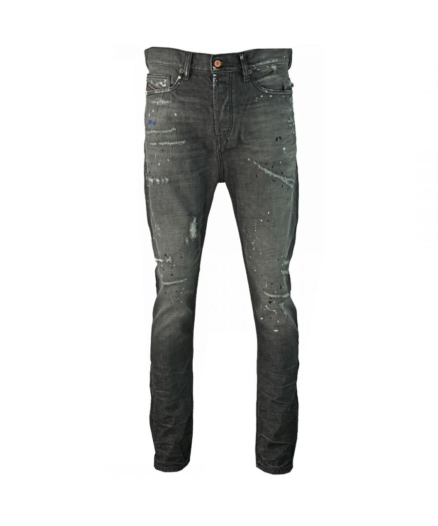 Diesel D-Vider 083AB spijkerbroek. Diesel D-Vider 083AB Wortel Fit Jeans. Normale taille, taps toelopende pijpen, knoopgulp. 100% katoen. Verfspetterdetail, vernietigd versterkt denim. Badge met het merk Diesel