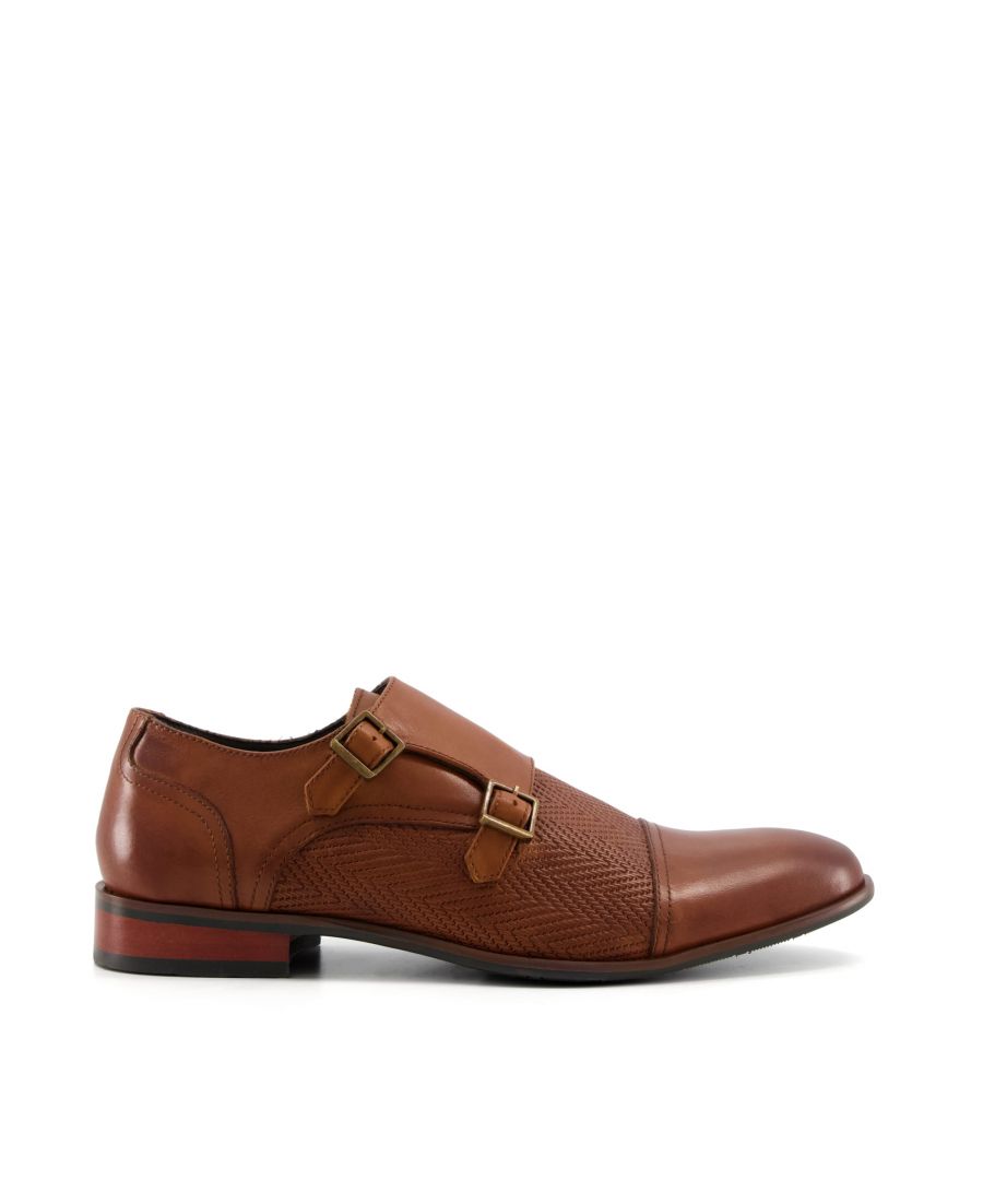 Formal settings call for sleek, smart shoe in durable matte leather. This sophisticated style is finished with buckles and rest on a low block heel.