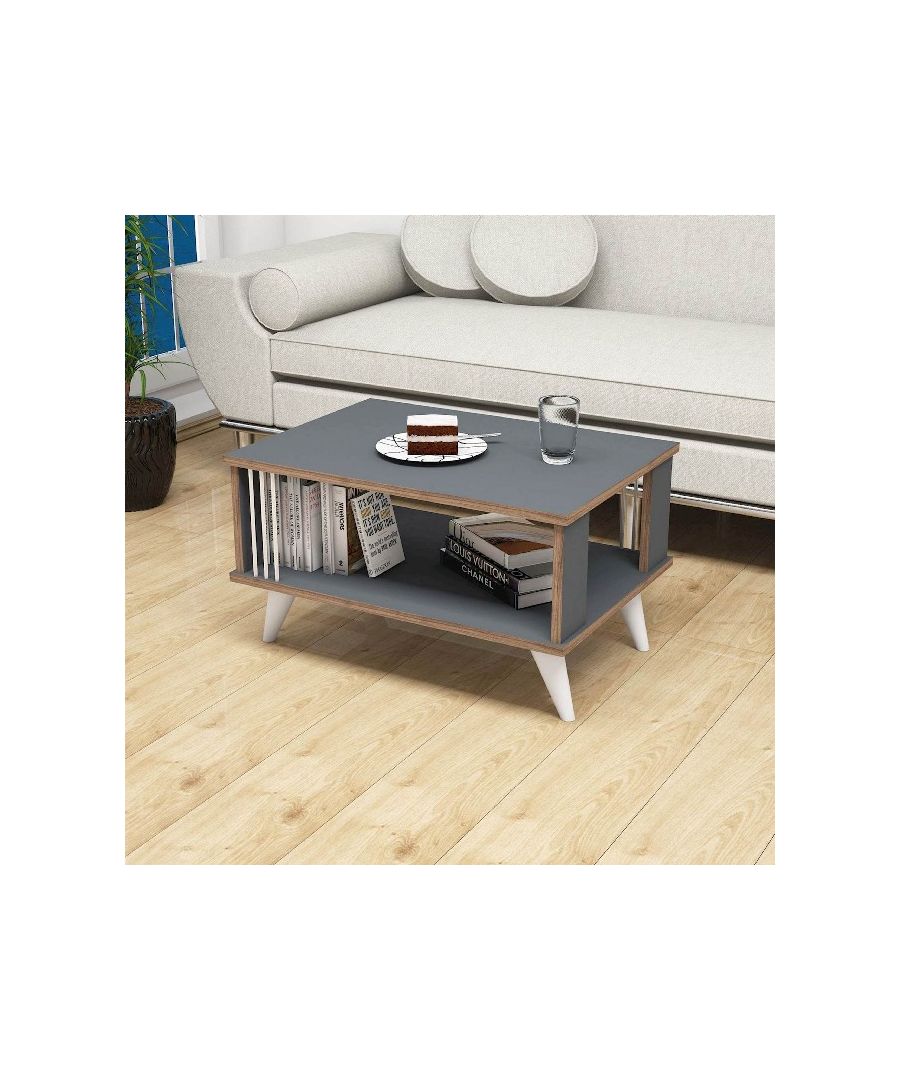 This stylish and functional coffee table is the perfect solution for furnishing the living area and keeping magazines and small items tidy. Easy-to-clean, easy-to-assemble kit included. Color: Anthracite, Walnut, White | Product Dimensions: W70xD50xH40 cm | Material: Melamine Chipboard, PVC | Product Weight: 9 Kg | Supported Weight: 10 Kg | Packaging Weight: W54xD5,5xH74 cm Kg | Number of Boxes: 1 | Packaging Dimensions: W54xD5,5xH74 cm.