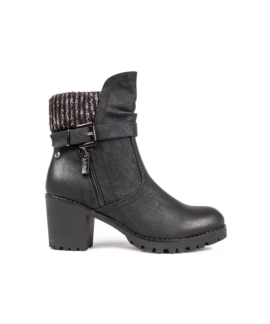 Women's Black Lotus Jodie Zip-up Ankle Boots With Textured Synthetic Upper Featuring Decorative Outside Buckle Straps And Zip, And Textile Knit Ankle Collar. These Ladies' Block Heels Have A Warm Fleece Lining, Cushioned Insole, Branded Stud Detail, And Synthetic Sole With Cleated Tread.