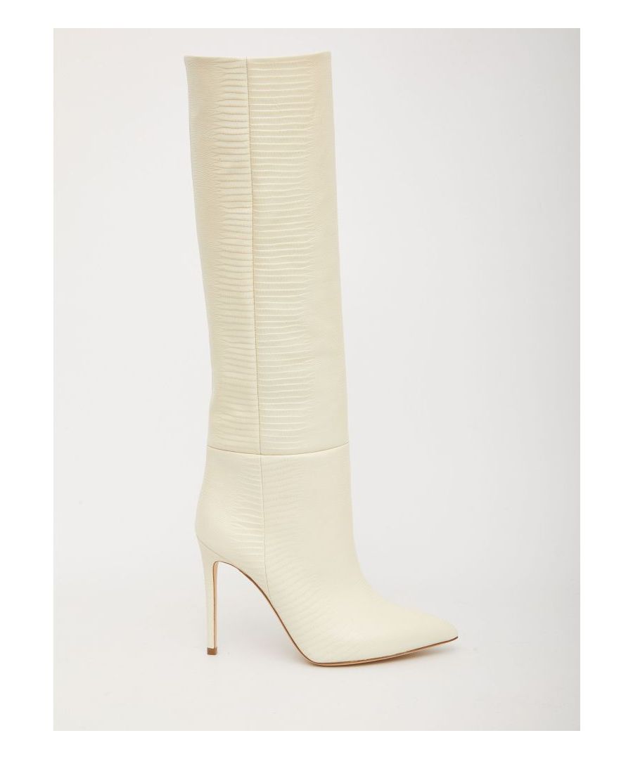 Knee-high boots in lizard-skin effect cream-colored leather. They feature pointed design and stiletto heel. Heel height: 10,5cm