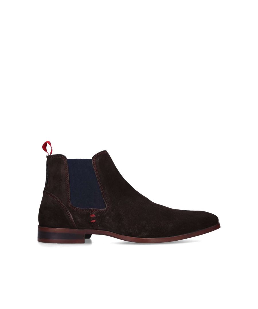 Pax by KG Kurt Geiger is a brown ankle boot with elasticated side panels.