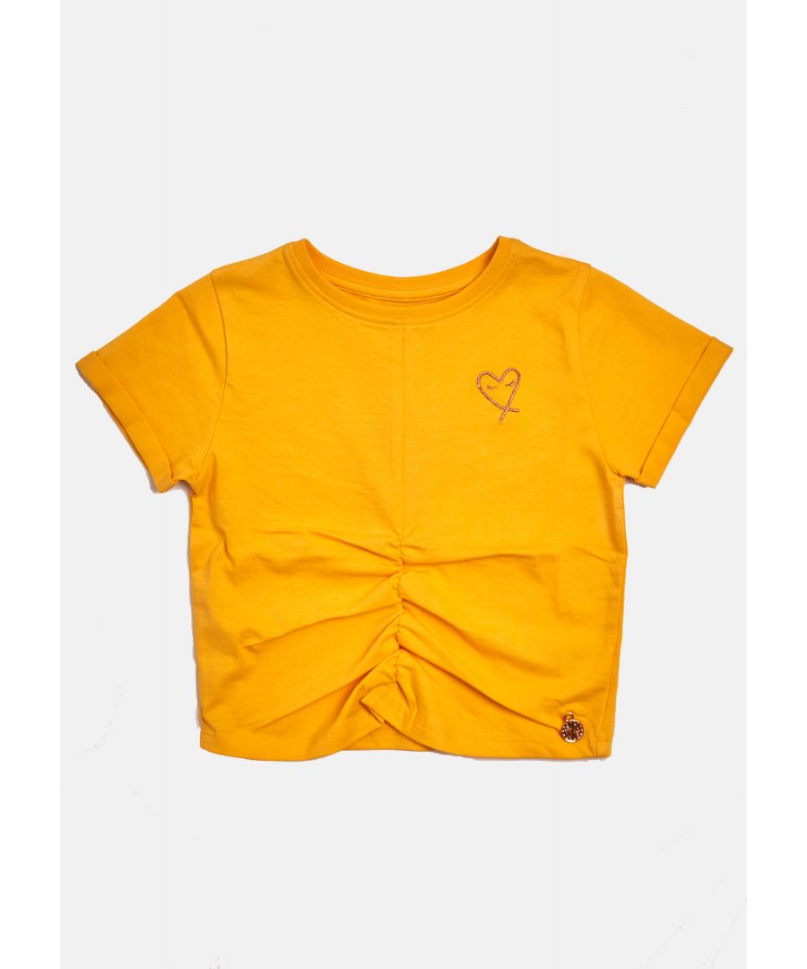 Simple yet sylish!  A super soft cotton jersey tee with rib neckline. A gentle gathered front and embroiderd logo it's a wardrobe staple.   Angel & Rocket cares – made with fairtrade cotton   Ochre   About me: 100% cotton.   Look after me – Think planet  wash at 30c