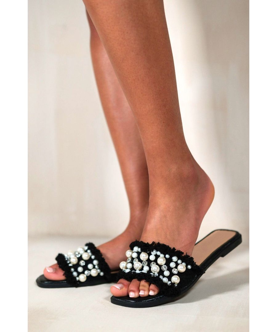 These fabulous flat sliders feature pearl and diamante detail front strap that adds the perfect amount of sparkle to your outfits. These flat slider is not only beautiful but is great to give you that little extra height you desire.