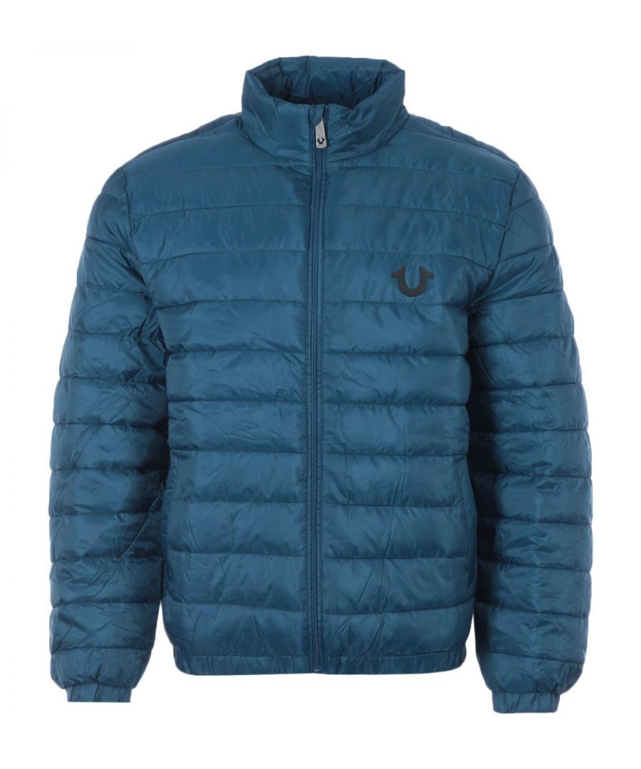 Founded in L.A back in 2002  True Religion have become global denim experts who have redesigned and reinvented the traditional five pocket jean. They quickly became known for quality craftsmanship  bold designs and the iconic lucky horseshoe logo.The Slim Puffer Jacket is crafted from a pure polyester fabric filled with a lightweight padding in a quilted design providing warmth and style. Featuring a stand collar with a full zip fastening  twin welt pockets and elasticated trims. Finished with the iconic True Religion Horseshoe logo at the chest.-Regular Fit-Polyester Composition-Quilted Padding-Stand Collar with Full Zip Closure-Twin Welt Pockets-Elasticated Cuffs & Hemline-True Religion Branding