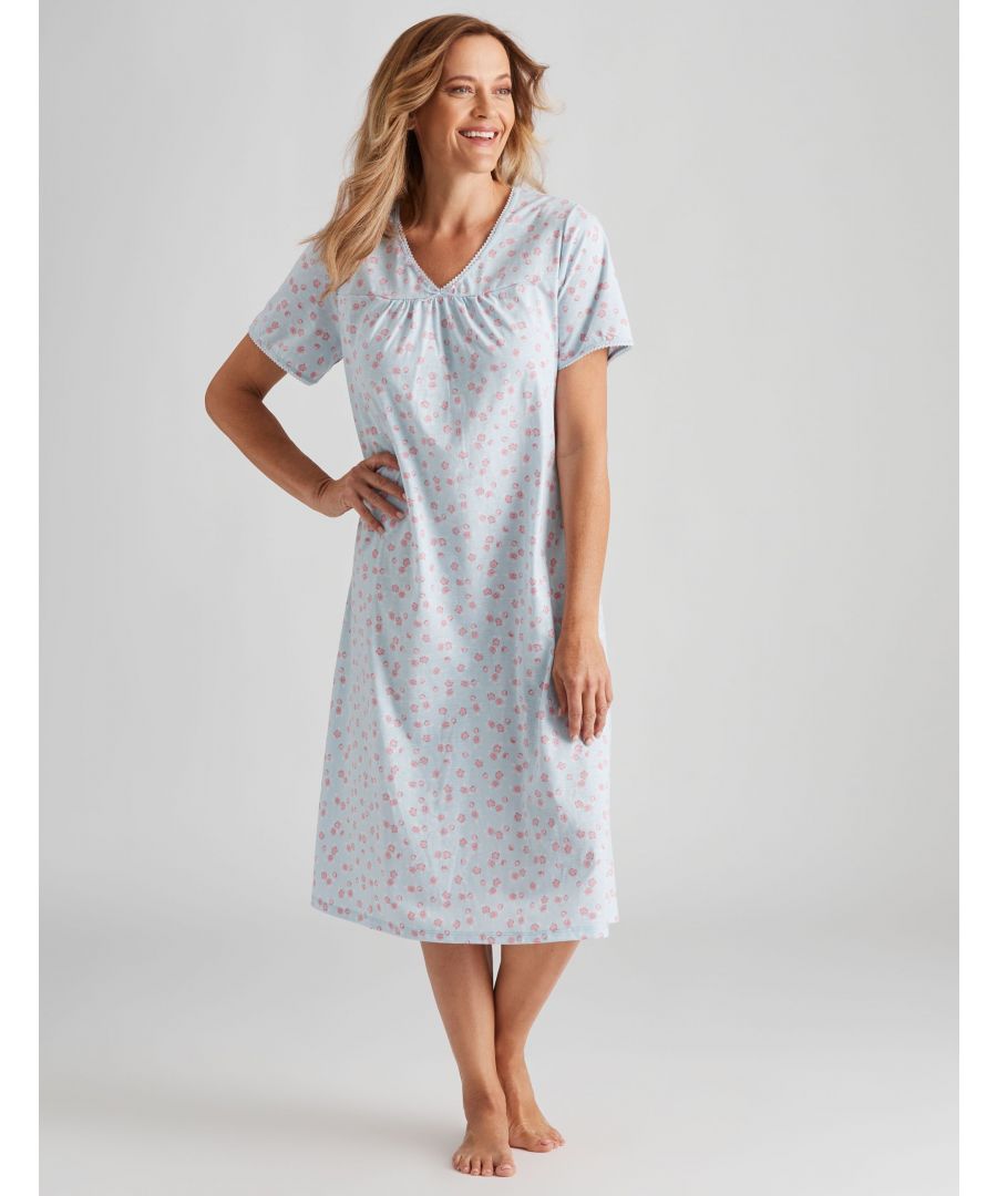 Experience an elegant evening with this florals print nightie. Made from sumptuous material, this piece is perfect for any special occasion. The vneck and midi length will make you feel like royalty, while the cap sleeves provide extra coverage on those chilly evenings. This short sleeved floral print nightie is perfect for those hot summer nights. The cap sleeves and v neckline will keep you cool all night long while the light fabric makes it easy to dress up or down with ease. -- This cozy nightie looks like it's straight out of a fairytale! Made from a soft and comfy material, this nightie features a beautiful flower print. Pair with your favorite pair of leggings for an easy breezy outfit that is perfect for warmer summer nights. This cap sleeve dress is oh so chic! With its short sleeves and v neckline, this piece is perfect for those warm summer days or lazy evenings. The floral print in this piece will add some extra flair to your outfit and keep you feeling styled at all times! -- Introducing our newest sleepwear line. With it's cute cap sleeves and v-neck, this piece is perfect for any occasion. It features an array floral prints that will complement your style perfectly! This short sleeve crop top is perfect for those warm summer days or nights. It's made of breathable fabric which keeps you comfortable all night long, while the flowery print adds some personality to any outfit! -- Our sleeved crop top is the perfect addition to your summer wardrobe. Made from our soft and breathable fabric, it features a v neckline that will leave you feeling cool and looked after all day long. Be chic in this elegant tea-length dress. Topped with delicate florals, this piece is perfect for your next special occasion. -- This nightie is perfect for all occasions. With its v neckline, it will keep you looking fashionable all day long. The cap sleeves and loose fitting design make it easy to slip into without feeling too restricted.Material:  65% Polyester / 35% Cotton