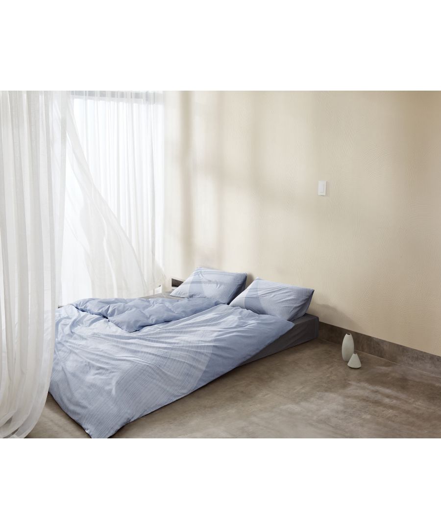 Classic minimalism gets a modern update with the Oversized Paintstroke Duvet Cover from Calvin Klein. The bedding features a blocked and a cut graphic design digitally printed on a 100% cotton, 300TC Sateen ground and reverses to same pattern on the back giving a contemporary update to your bedroom decor with its simple and neat cut. Available in charcoal and  light blue. Pair it with matching pillowcases