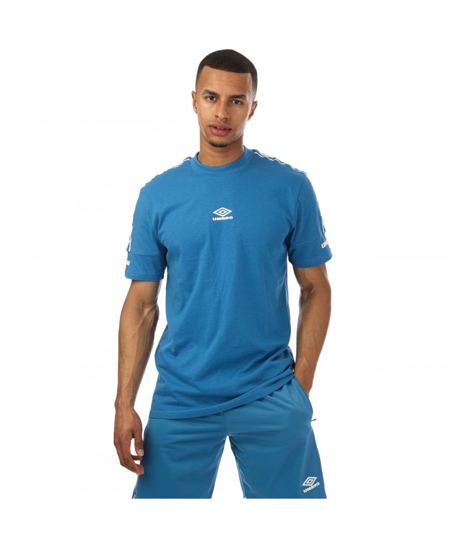 Mens Umbro Diamond Taped Crew T- Shirts in blue.- Crew neck.- Shorts sleeves.- Diamond tape running down on the arms and shoulders.- Matte plastisol print to chest and sleeve panel.- Regular fit.- 100% Cotton.- Ref: UMTM0602OGCBLU