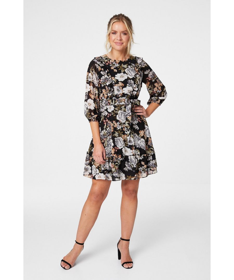 Add a bold floral print skater dress to your closet this season. With a round neck, 3/4 sleeves, a tie waist and a tiered skater skirt sitting above the knee. Pair with black heels for the perfect desk to dinner look.