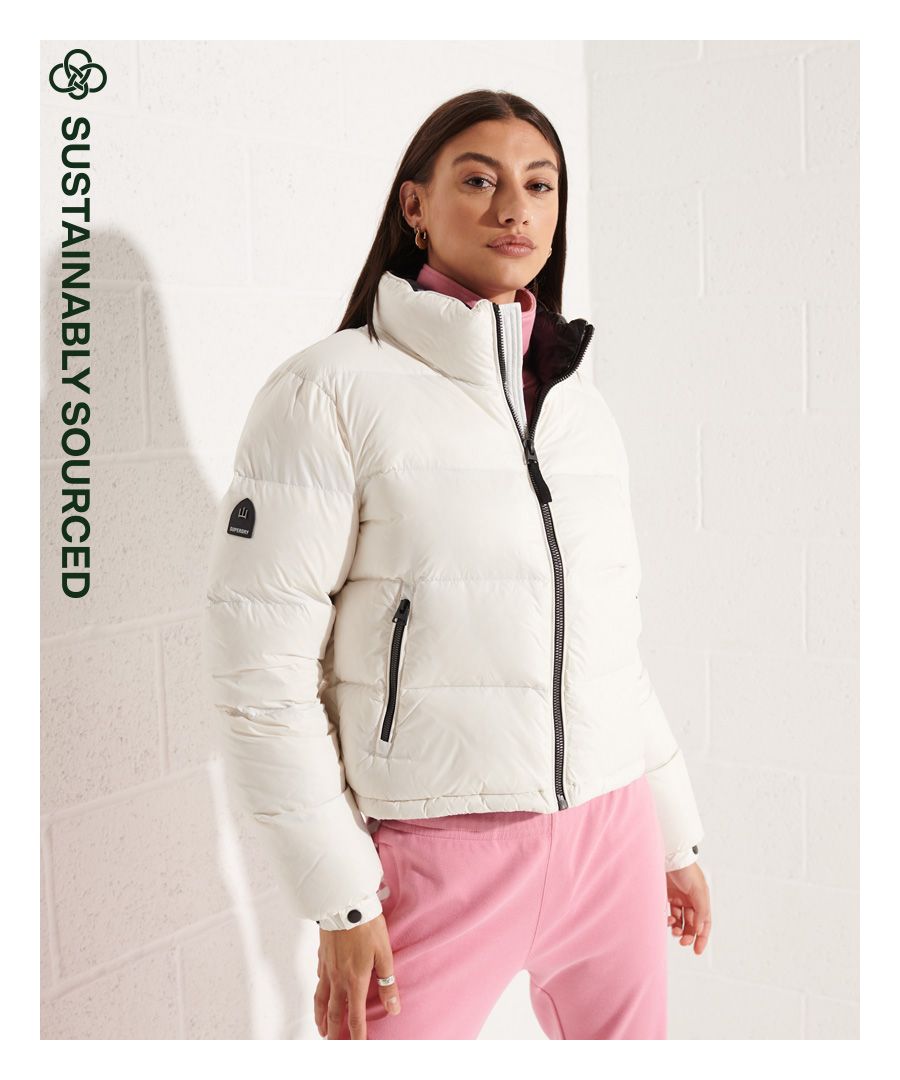 Stay warm in style this season. This padded jacket has been filled with a 90/10 down filling for extra comfort and warmth. Available in a variety of colours so that you can pick which one best suits your style.Main zip fastening90/10 down fillingTwo pocket designBungee cord hemElasticated popper cuffsSignature logo badgeSuperdry is certified by the Responsible Down Standard, products certified to the responsible down standard contain down or feathers from farms certified to animal welfare requirements.