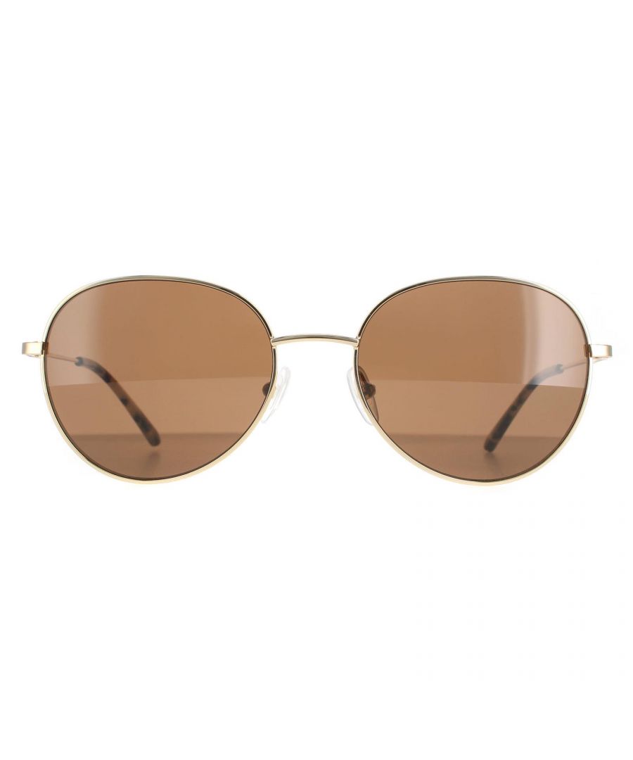 Calvin Klein Round Womens Gold Solid Brown CK20104S CK20104S are a classic round style made from lightweight metal. The frame features adjustable nose pads and plastic temple tips for all day comfort. The Calvin Klein branding features on the temples for brand recognition.