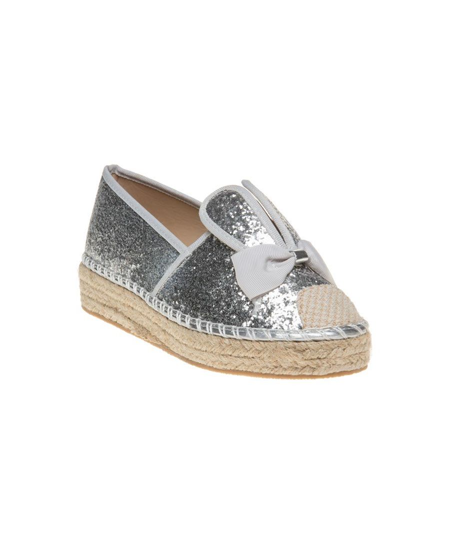 The Charm Espadrilles From Solesister Feature Silver Glitter Uppers With A Chunky Rope Sole And Bunny Ear Detail For Glamorous Beach Wear.