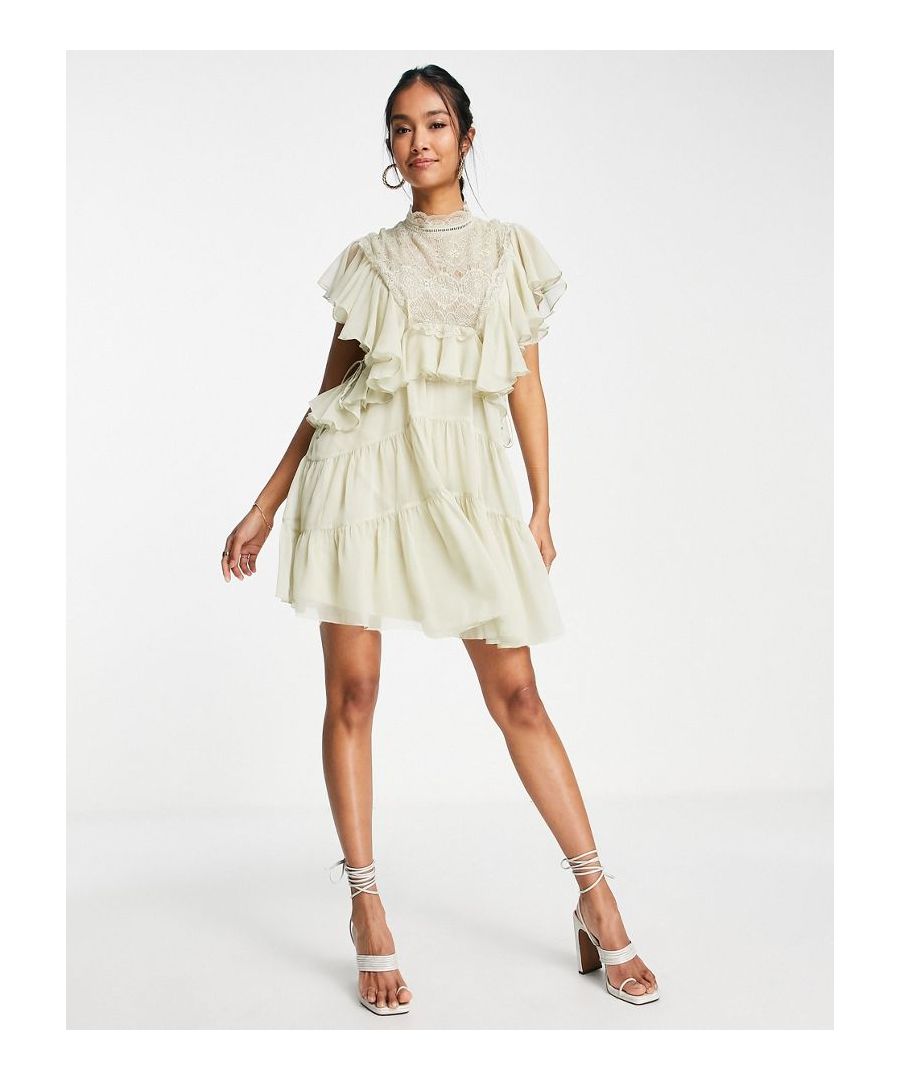 Mini dress by ASOS DESIGN All dressed up High neck Lace bodice Ruffle sleeves Tie back Zip-back fastening Regular fit Sold by Asos