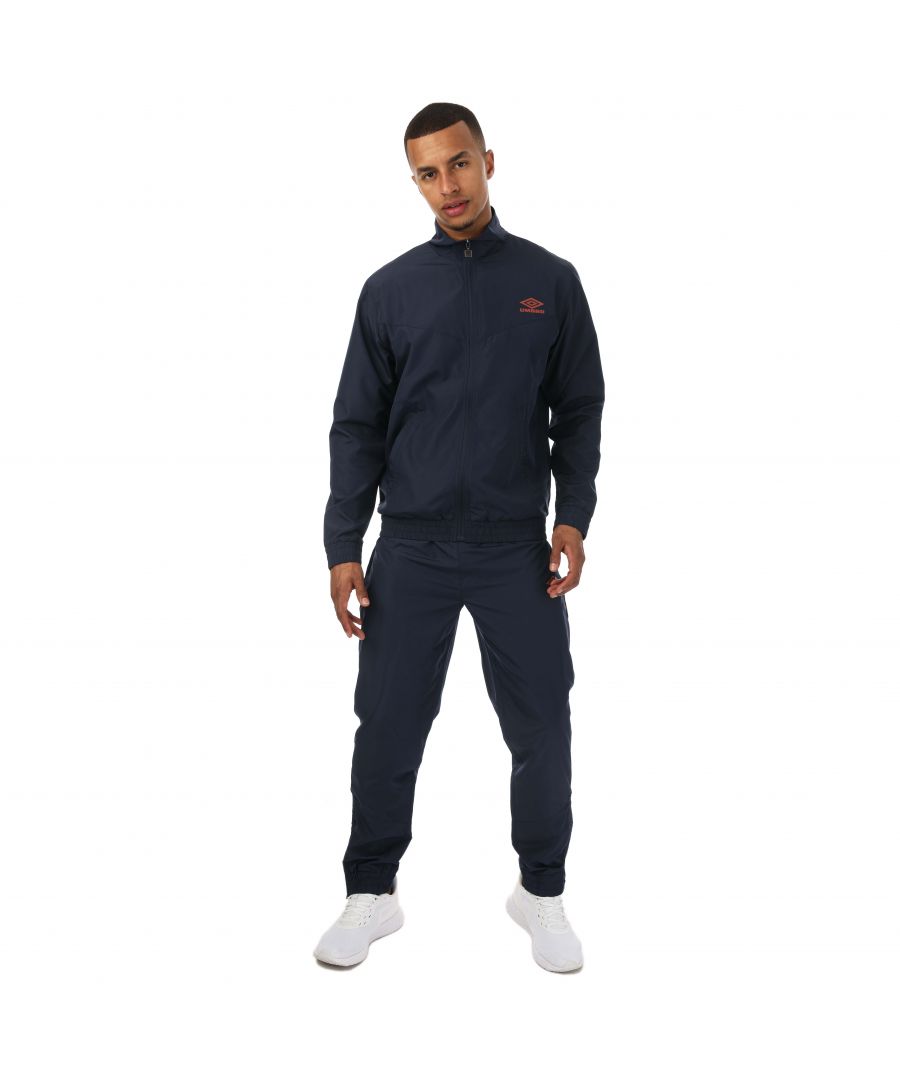 Mens Umbro Diamond Woven Poly Tracksuits in navy.- Jackets:- Reverse coil zip puller.- Side slip pockets.- Zip fastening.- Contrast sleeve & front panel.- Elasticted cuff and hem.- 100% Polyester.- Bottoms:- Grown on waistband with inner drawcords.- Slide slip pockets.- Contrast panels to leg.- Transfer print to leg.- Elasticted cuff.- Zips to side leg.- Slim fit.- 100% Polyester.- Ref: UMJM0639OG7NAV