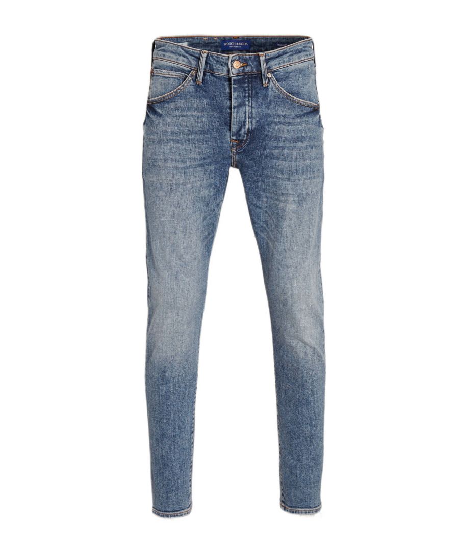 Deze slim fit jeans voor heren van Scotch & Soda is gemaakt van stretchdenim. Dit 5-pocket model heeft een rits- en knoopsluiting.details van deze jeans:stijlnaam: Singel 5-pocket