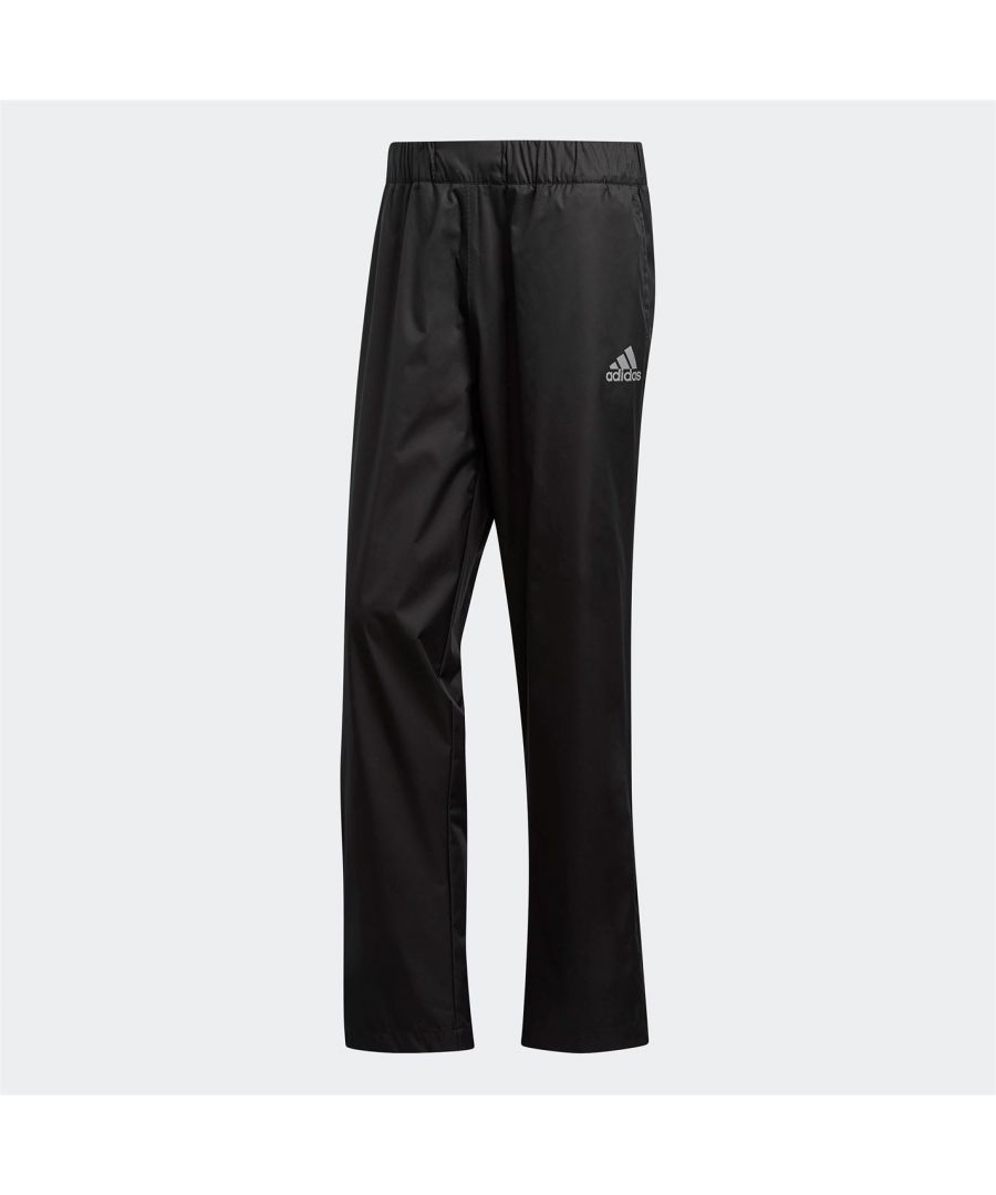 adidas Waterproof Golf Trousers Mens - These adidas Waterproof Golf Trousers are crafted with an elasticated waistband and drawstring fastening for a classic look. They feature 2 pockets and are a lightweight, waterproof construction. These trousers are designed with a signature logo and are complete with adidas branding. > Weatherproof: Water Resistant > Fit Type: Standard Fit > Rise: Mid Rise > Length: Full Length > Fabric: Polyester > Fastenings: Elasticated Waist > Cuffs: Open Hem > Lining: Unlined > Pockets: Open Pockets > Style: Waterproof Trousers > Care Instructions: Follow Care Instructions