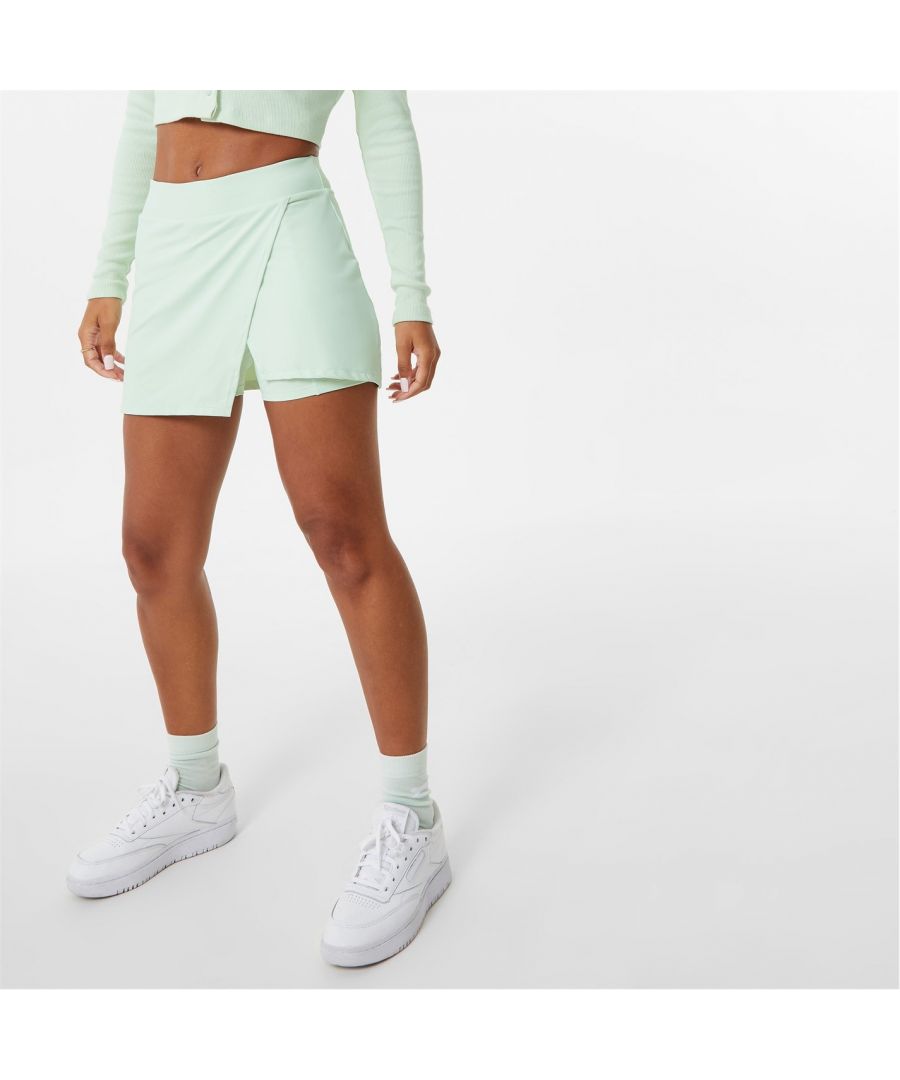 Slazenger x Sofia Richie Asymmetric Skort - Selected by Sofia Richie - known for her Insta worthy casual looks and sportswear brand Slazenger, this edit combines both parties elements or a stylish athleisure aesthetic. The 2 in 1 skirt design features a flattering asymmetric shape to the front with additional ball pocket, crafted rrom a polyamide mix that stretches to adapts to shape for a sleek look. Complete with Slazenger branding , pair with the brands edit Button Down Top for a cute co-ord or with contrast crop to show off your unique style.