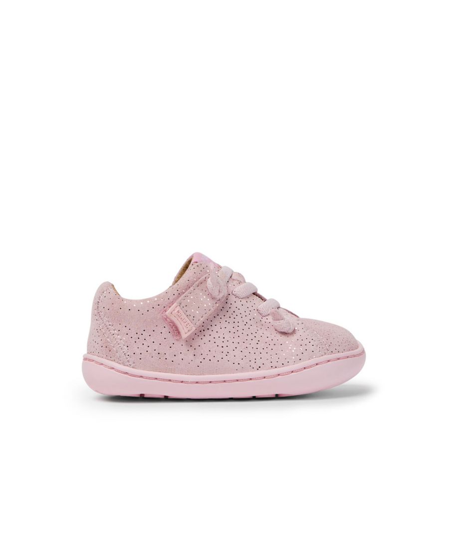 Pink nubuck girls' shoes with glitter effect, stitched rubber outsoles (20% recycled), recycled PET elastic laces, and hook-and-loop closing system.\n\nThe First Walkers range features flexible-yet-sturdy styles made for little ones who are taking their first steps. \n\nA Camper Icon that evolves with every season. Peu is functional simplicity inspired by walking barefoot. It is 360-degree stitched and built with a Strobel construction technique, guaranteeing unmatched flex and durability under any conditions.