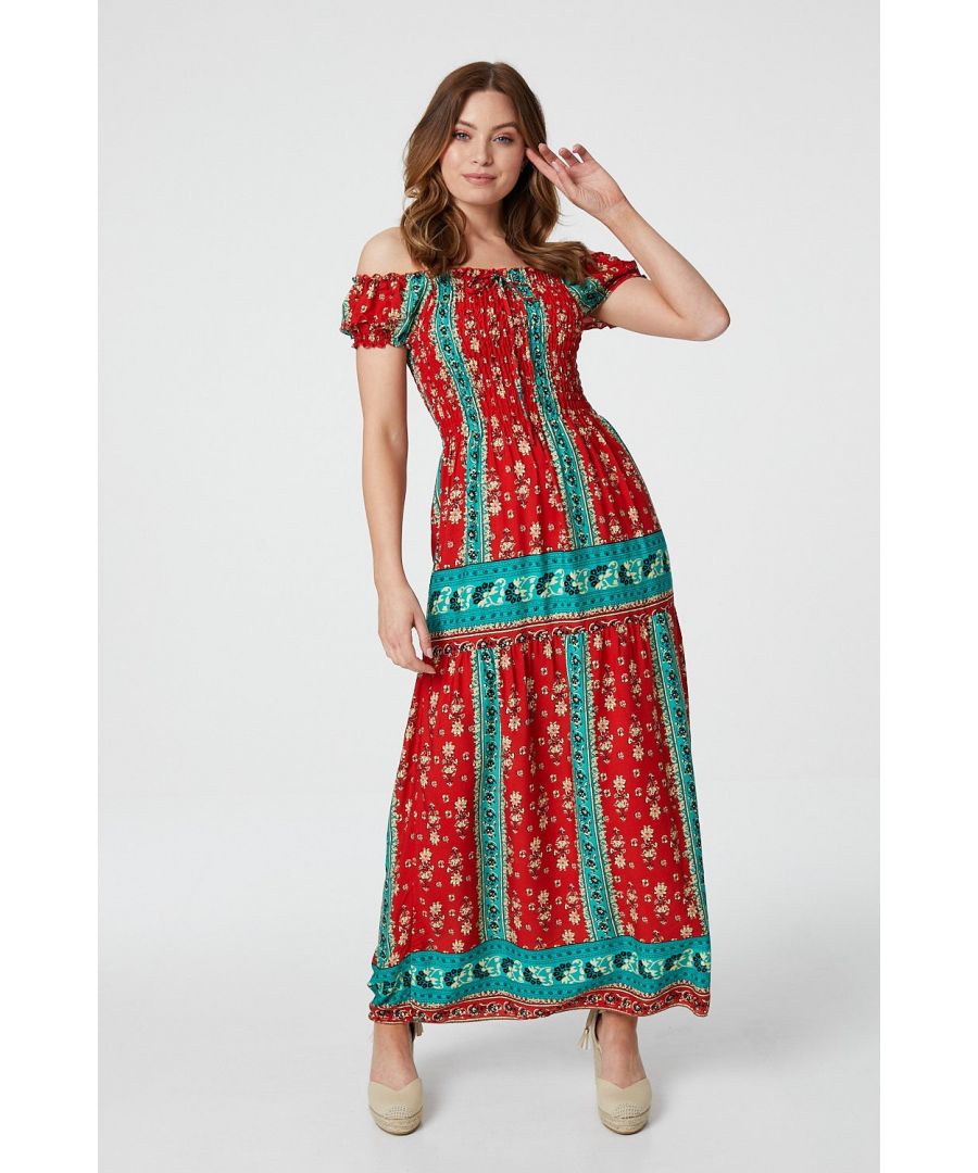 Add a statement making printed off the shoulder maxi dress to your closet with this retro print dress. With a bardot neckline, cap sleeves, a shirred bodice, a full length straight skirt with a border print detail. Pair with flat strappy sandals for the ultimate comfortable daytime look or with nude espadrille wedges for a weekend wedding.